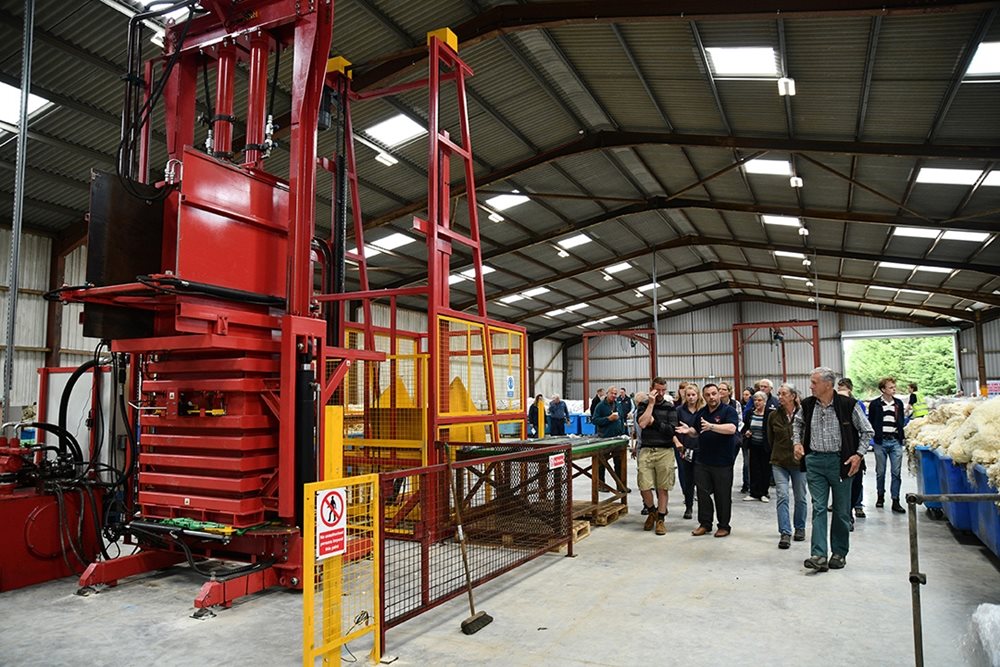 Producers tour the facilities at the new depot